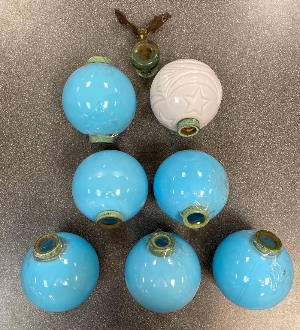 Group of 8 Glass Lightning Rod Globes: Includes LRI glass, 6 blue glass, And 1 white Star, Largest measures 5 x 5 x 4 1/2 inches.