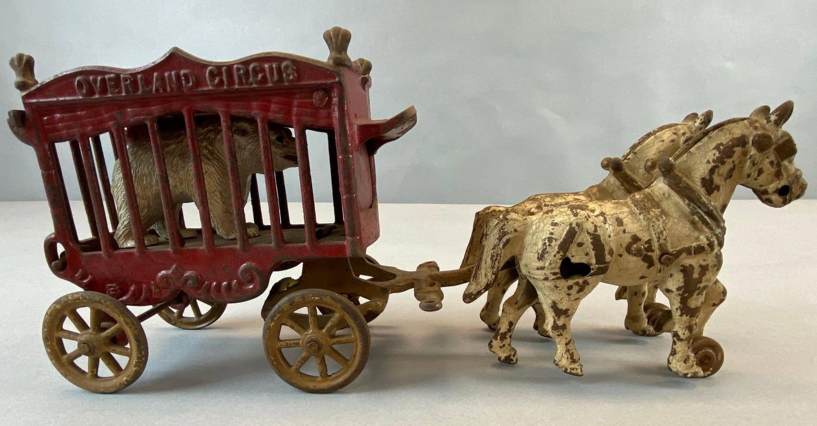 Vintage Kenton Cast Iron Circus Wagon With Polar Bear: Paint wear. Measures 6 1/4 x 14 x 4 inches.