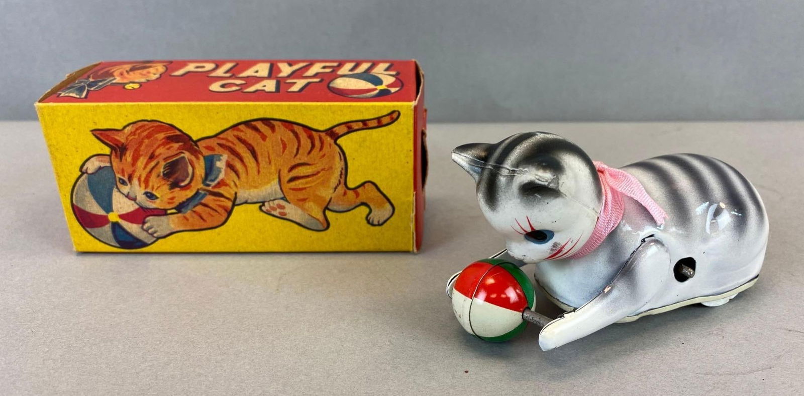 Vintage Tin Litho Playful Cat Windup Toy in Box: Some wear, works. Box measures 2 x 5 1/2 x 2 1/2 inches