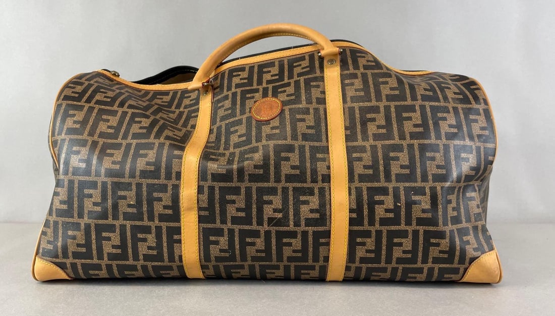 Fendi Duffel Bag: Zipper needs repaired. Measures 10 1/2 x 21 x 10 1/2 inches