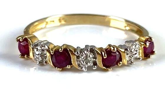 10K Gold Ruby and Diamond Ring: Round cut, prong set, 1.1g, size 6 1/4