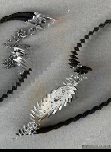 Bulova 23 14K White Gold with Diamonds Womens Wristwatch: Did not work in test. Number 820745. Measures 3 1/2 x 5/8 inches