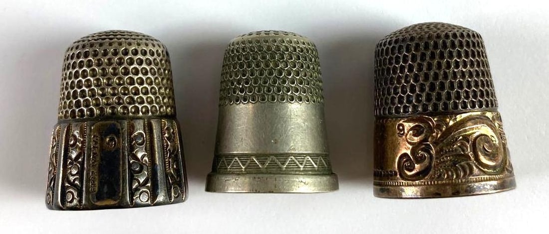 Group of 3 Antique Thimbles: Condition consistent with age, largest measures 1 x 3/4 inches
