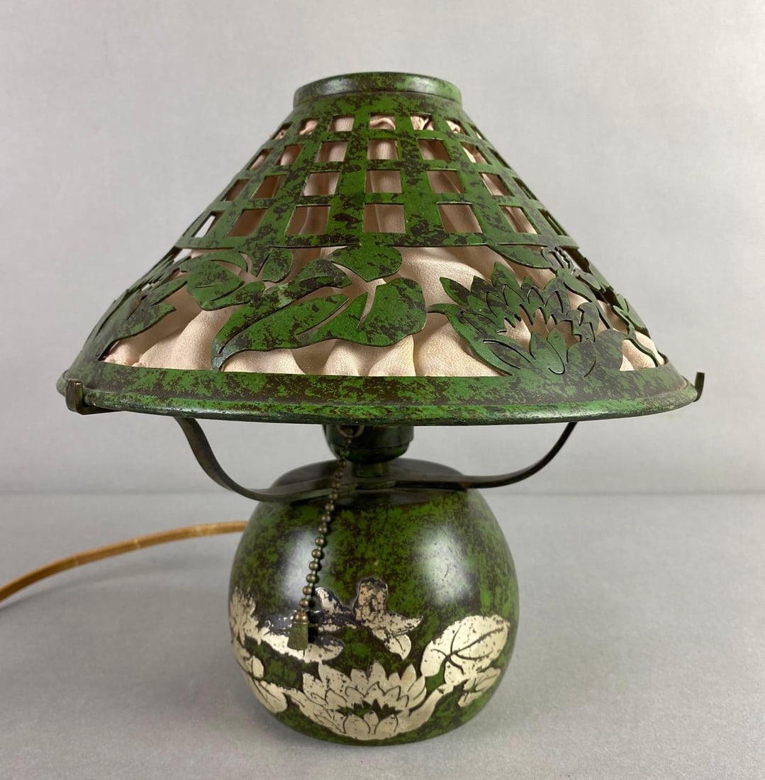 Arts and Crafts Heintz Applied Sterling Silver Design on Bronze Boudoir Lamp: Water Lily pattern silk lined shade, in working condition, small stains on shade, slight paint loss, measures 9 x 8 3/4 inches