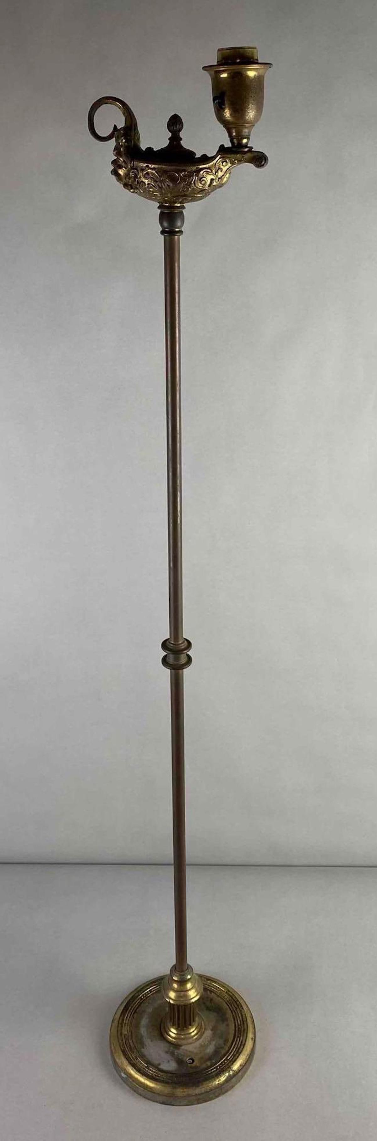 Antique Bradley and Hubbard Ornate Metal Floor Lamp: Condition consistent with age, not in working condition, bearded man under handle, measures 43 x 7 inches