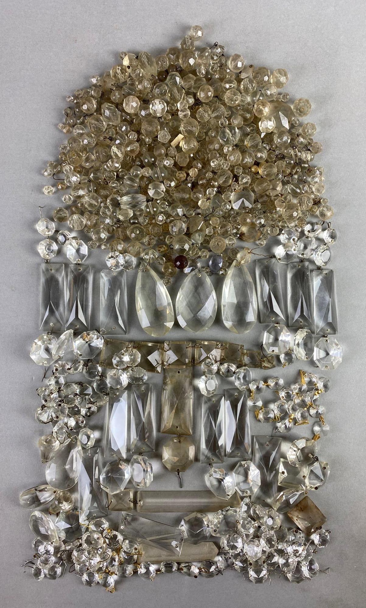 Group of 50+ Clear Glass Crystal Prisms: Parts cracked and chipped, largest measures 5 x 3/4 inches