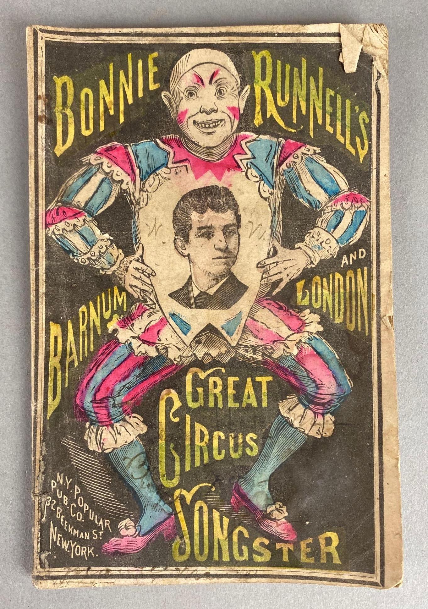 Antique Bonnie Runnells Barnum and London Great Circus Songster Song Book: N.Y. Popular Publishing Co, New York, Moisture damage throughout, Measures 6 1/2 x 4 1/4 inches.