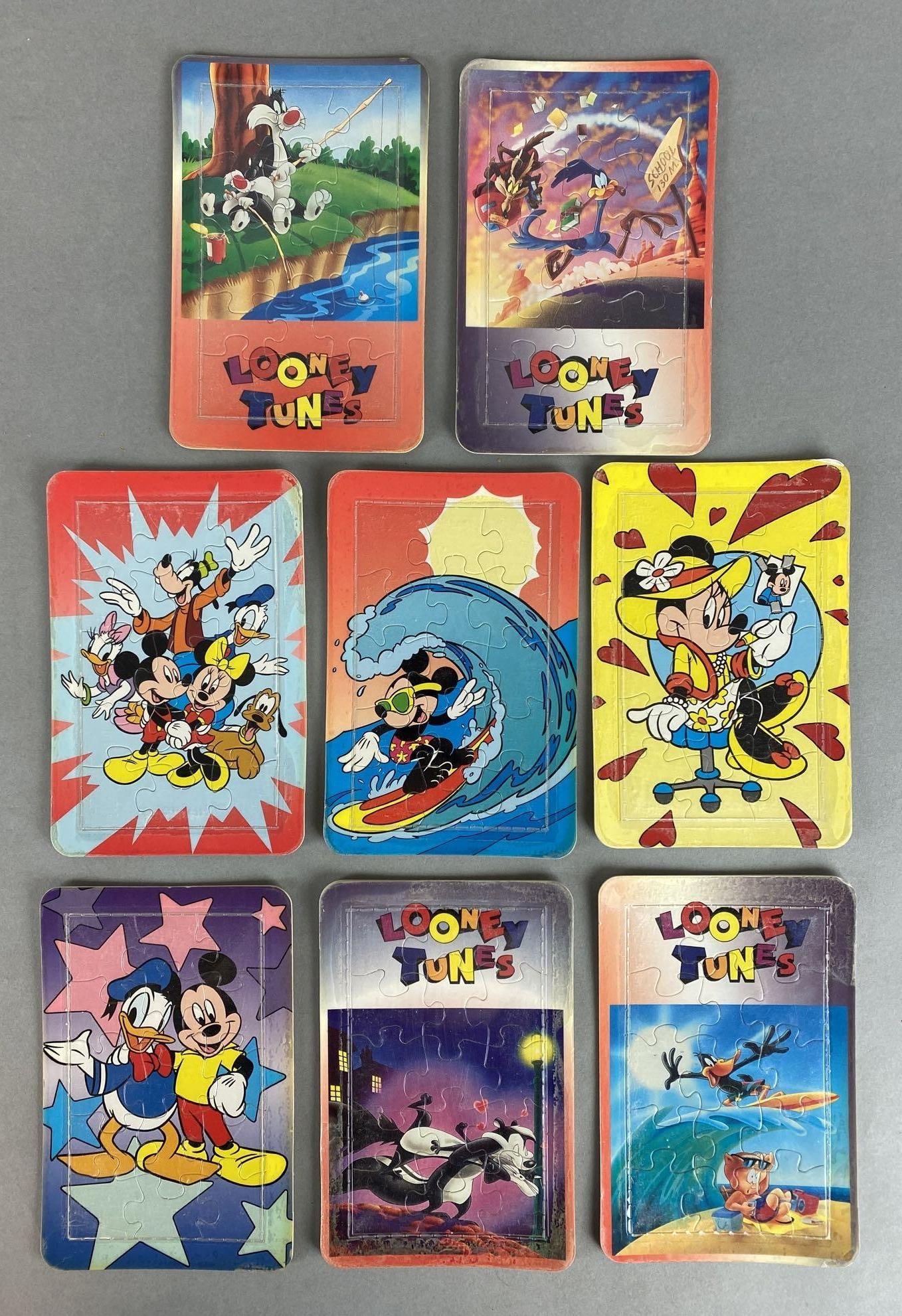 Group of 8 Disney and Looney Tunes Puzzle Postcards: Includes Mickey Mouse, Sylvester the Cat, Daffy Duck, and more, All measure 6 x 4 inches.