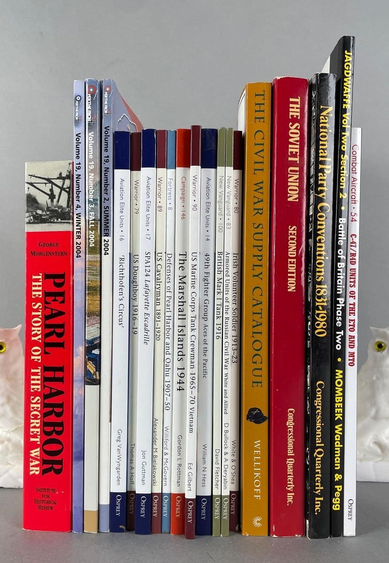 Group of 20 Wartime Books: Bookends not included.Includes Pearl Harbor, the civil war supply catalogue, US doughboy 1916-19, and more