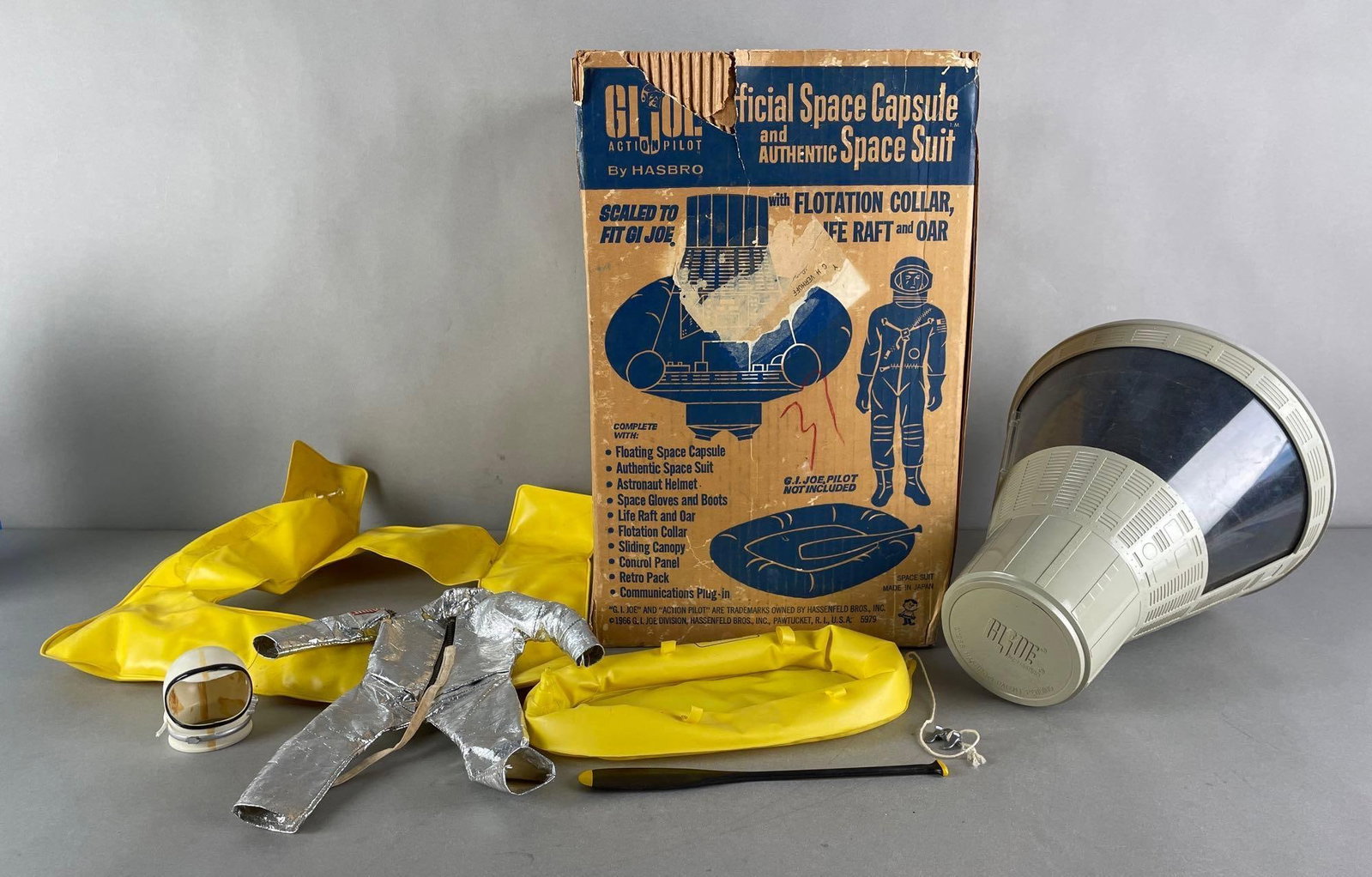 1966 Hasbro G.I. Joe Action Pilot Official Space Capsule: Includes original box, life raft and oar, spacesuit, helmet and more. Box measures 16 x 10 x 10 inches