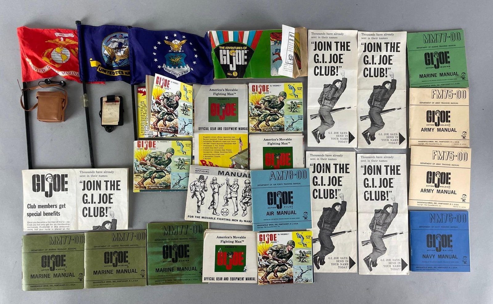 Group of 25+ Vintage G.I. Joe Manuals and More: Includes notepad with pencil, flags, comm box, and more for 12 inch figures