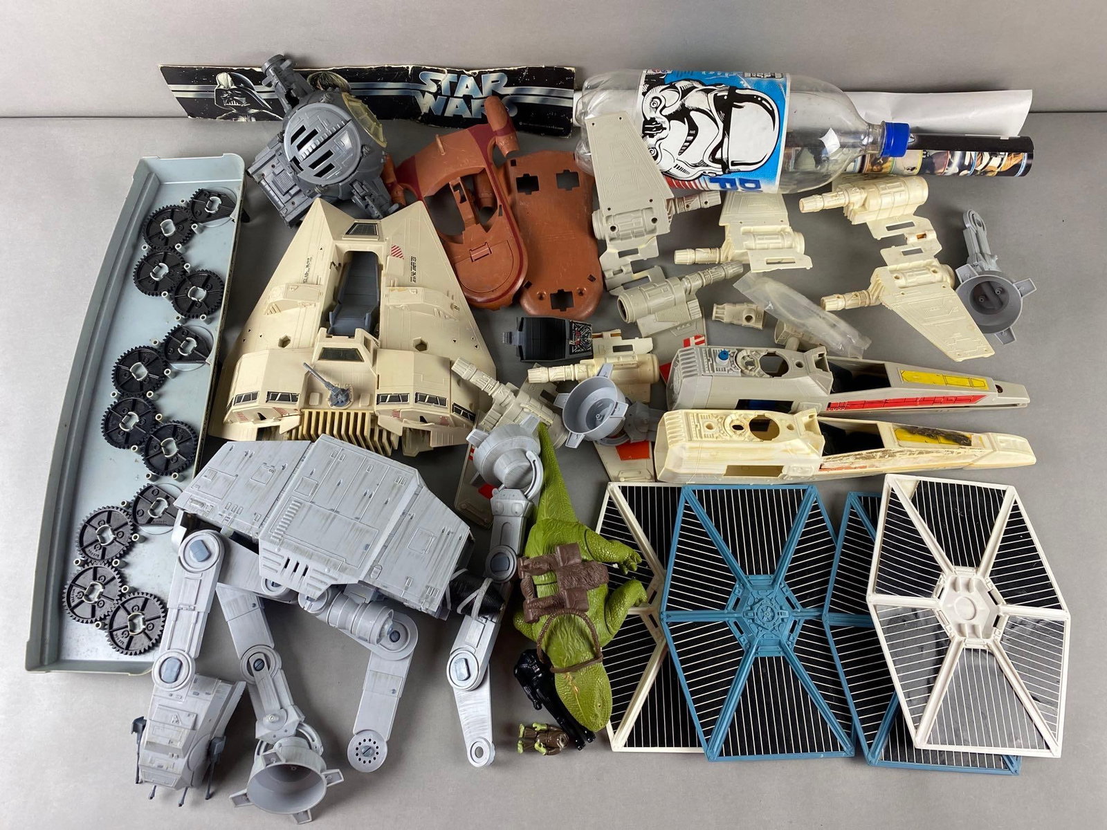Group of Stars Wars X-Fighters Armored SnowSpeeder and Accessories: X-Fighters and SnowSpeeder toys incomplete. Includes various accessories mixed condition and posters. X-Fighter measures 13 1/4 inches long.