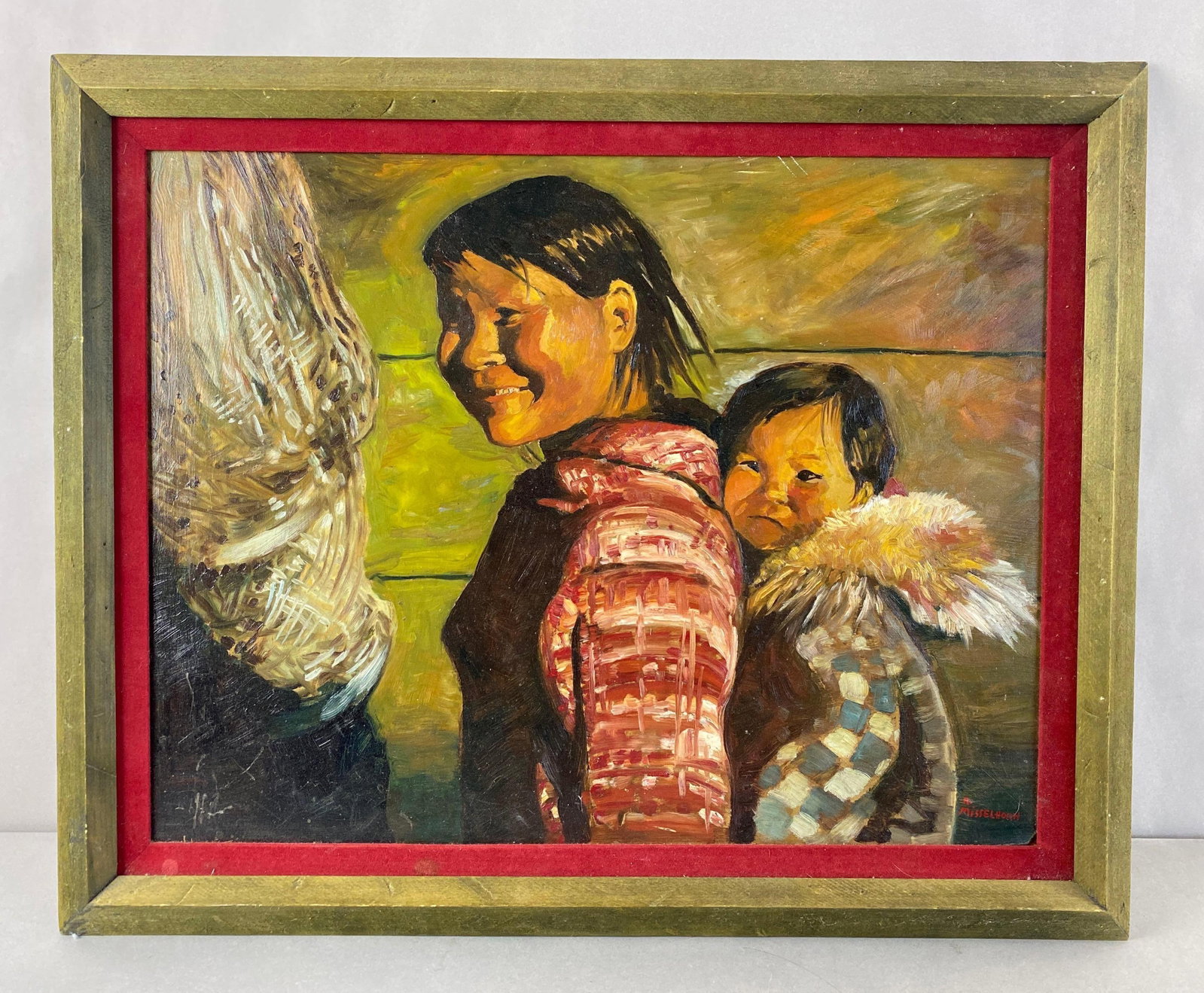 R. Misselhorn Smiling Inuit Woman With Child Oil Painting on Canvas: Slight wear on frame. Frame measures 22 1/2 x 27 1/2 inches. Painting measures 19 x 24 inches.