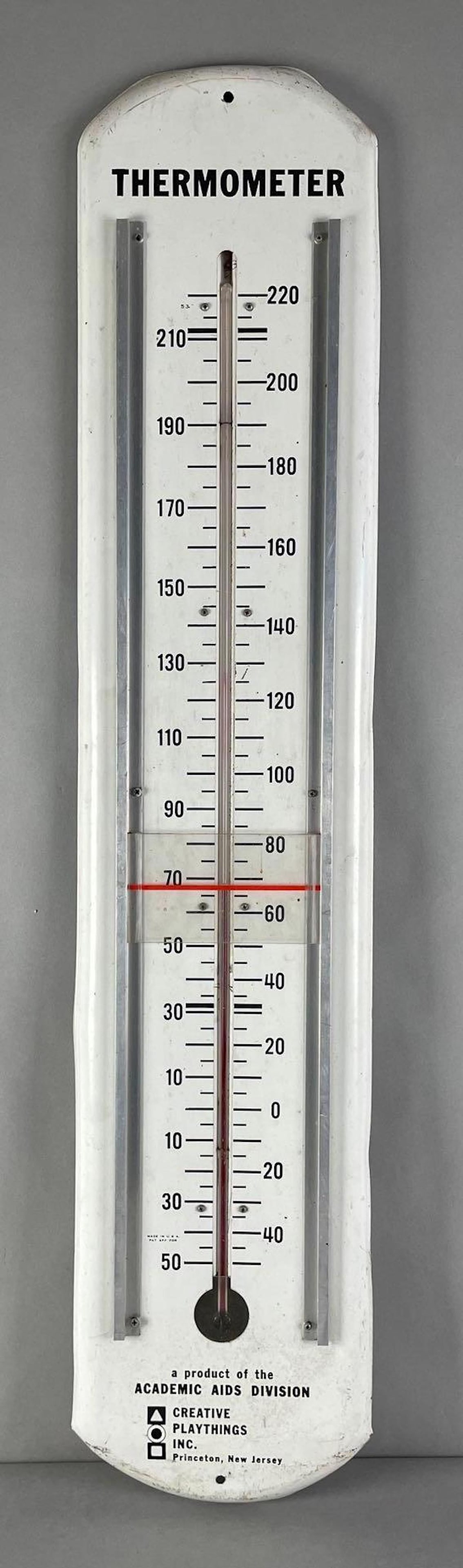 Vintage Creative Playthings Inc. Metal Advertising Thermometer: Slide and thermometer in working condition. Measures 38 3/4 x 8 inches
