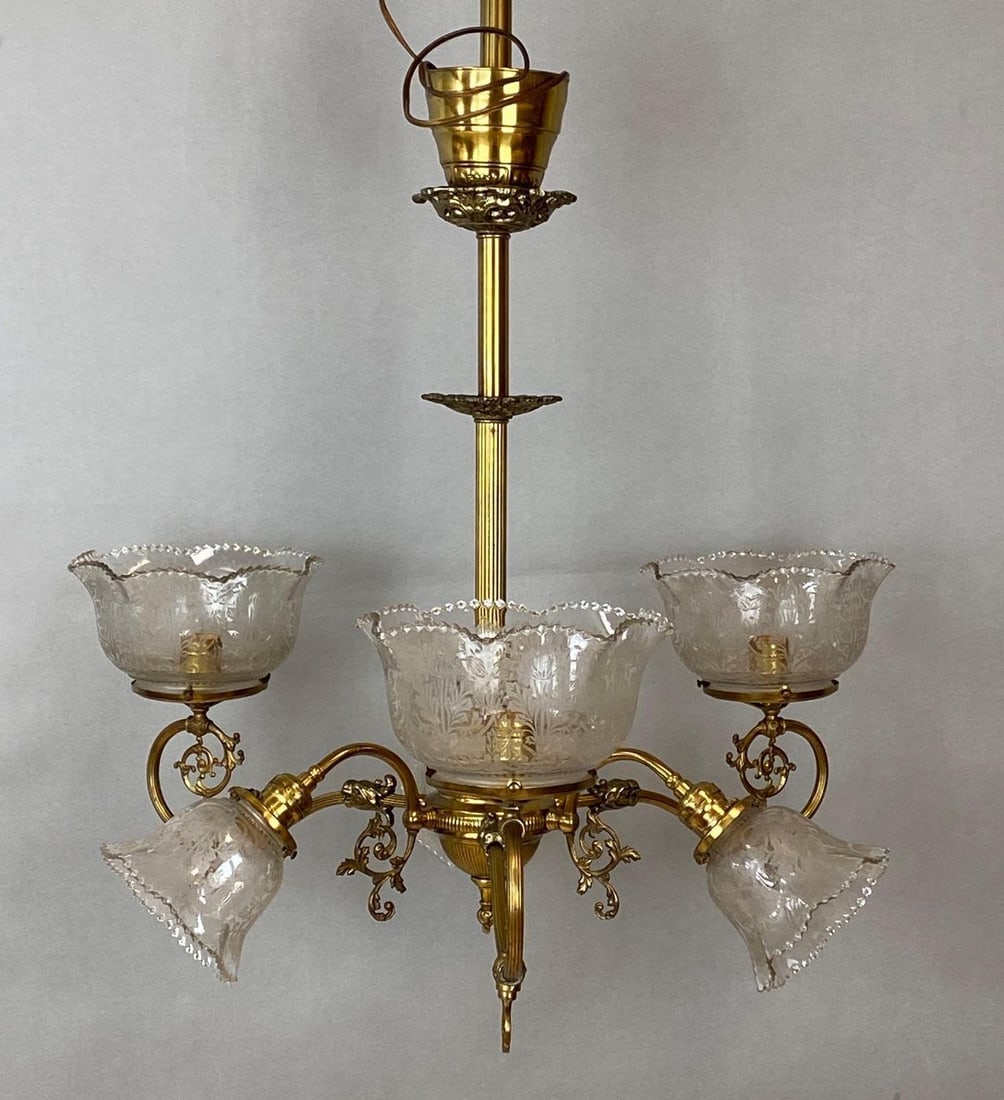 Victorian Brass Electrified Hanging Chandelier with Clear Etched Glass Shades: Untested, 6 Arm Chandelier, With 3 large and 3 smaller etched glass shades, Larger fitters measure 4 1/4 inches across, Smaller fitters measure 2 1/4 inches across, Measures 29 x 25 1/2 x 25 1/2 inche