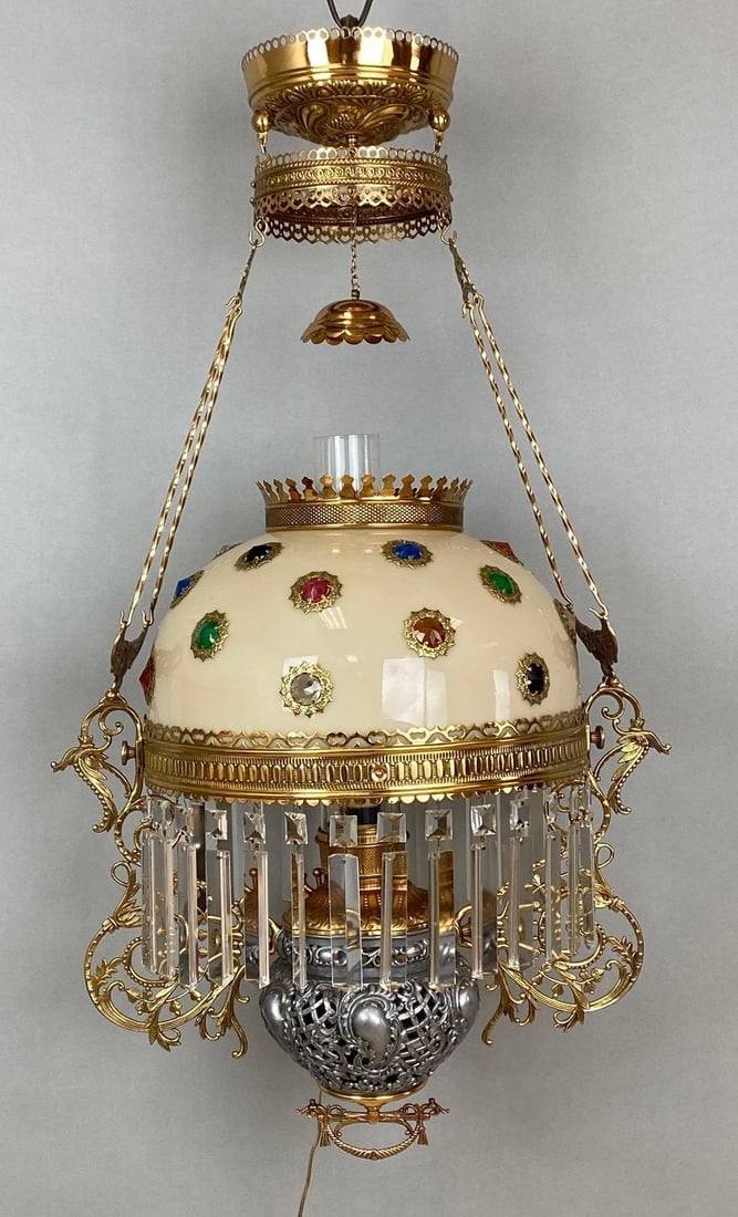 Victorian Electrified Brass Hanging Oil Lamp with Jeweled Shade: Untested, Some small fleabites in prisms, Main shade fitter measures 14 inches across, Chimney fitter measures 2 3/4 inches across, Measures 36 x 20 x 14 1/2 inches.