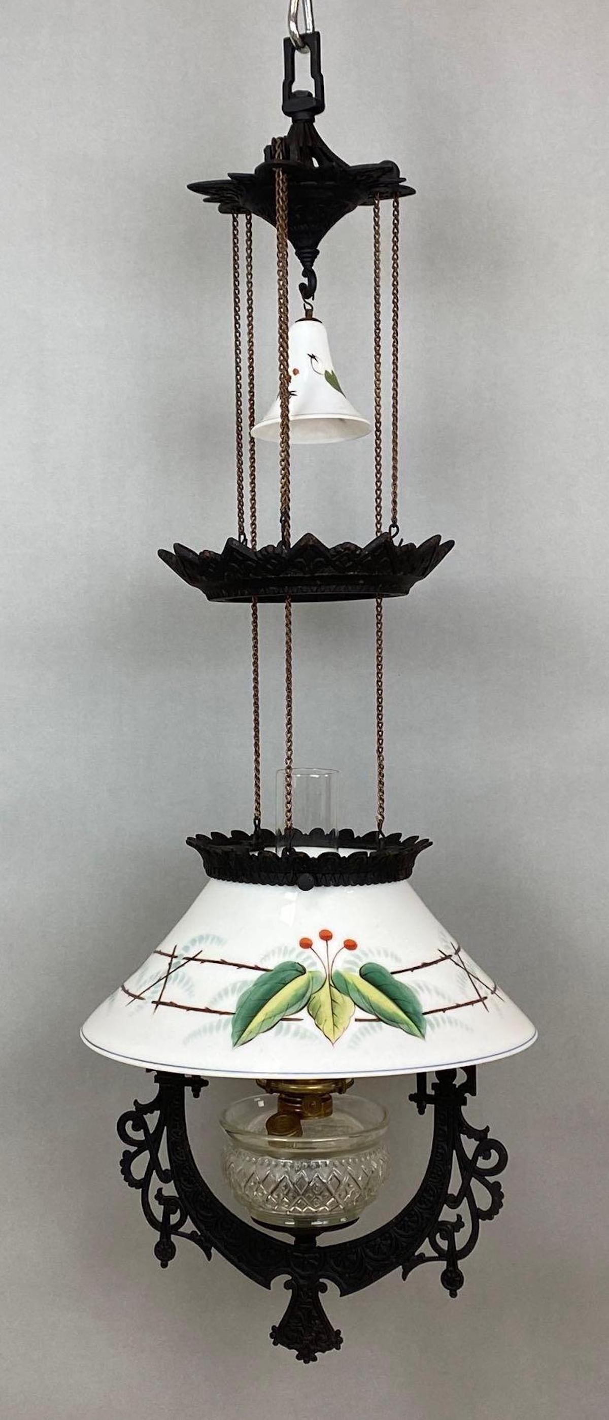 Victorian Bradley and Hubbard Cast Iron Horse Hanging Lamp: With Milk Glass Leaves and Berries Patterned shade, Counterweight adjustable height, Measures 44 1/2 x 14 x 14 inches as seen in photos.