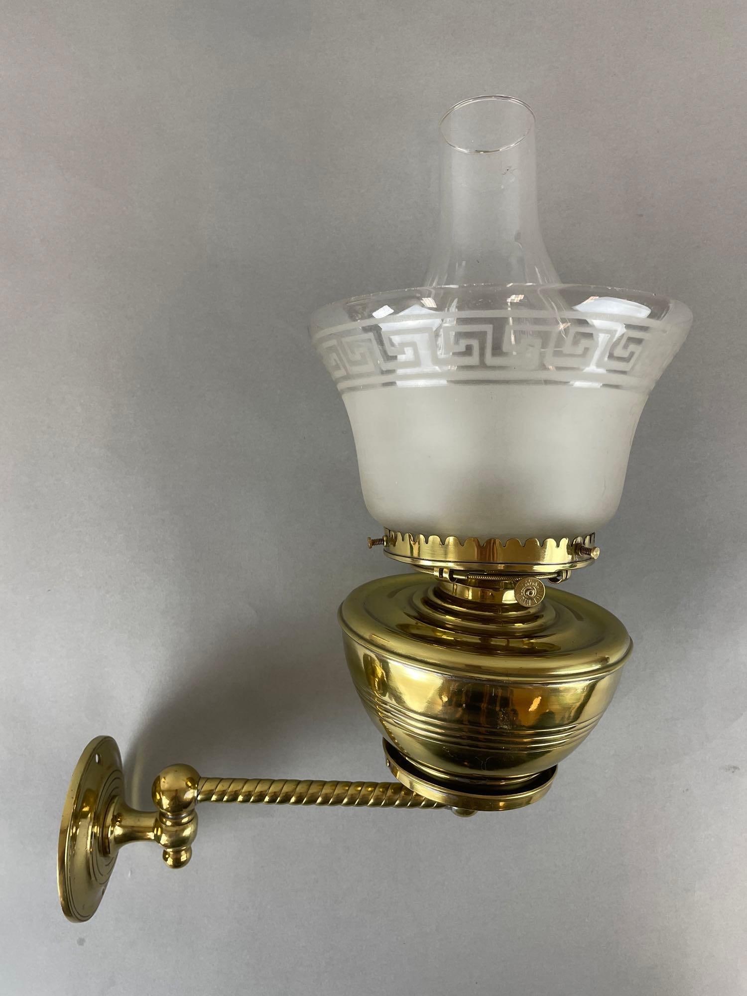 Victorian Brass Wall Sconce with Grecian Key Frosted Shade: Scovill mfg. co. Small chips on shade. Fitter measures 4 inches, 11 inches from wall, lamp measures 14 inches tall