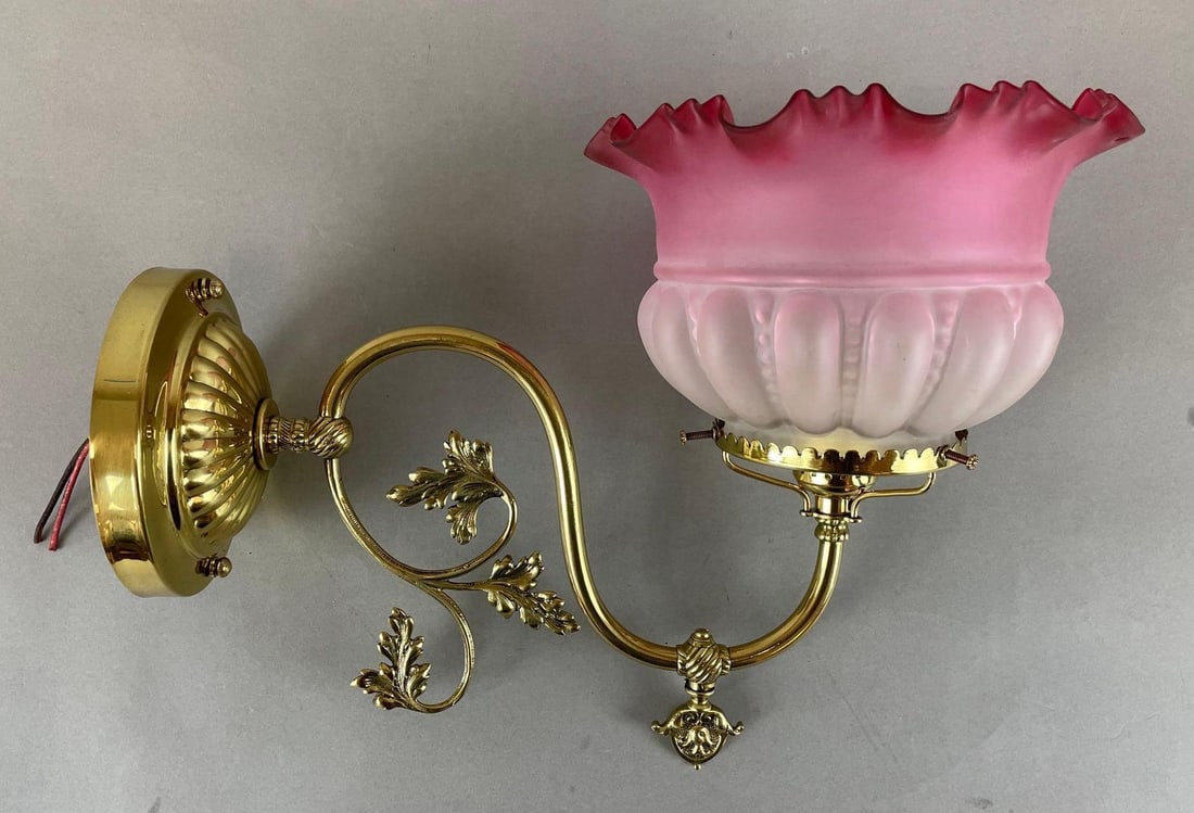 Victorian Brass Oil Wall Sconce with Cranberry Frosted Glass Shade: Ruffle edge, electric. Fitter measures 4 inches, 14 1/2 inches from wall, 10 1/2 inches tall