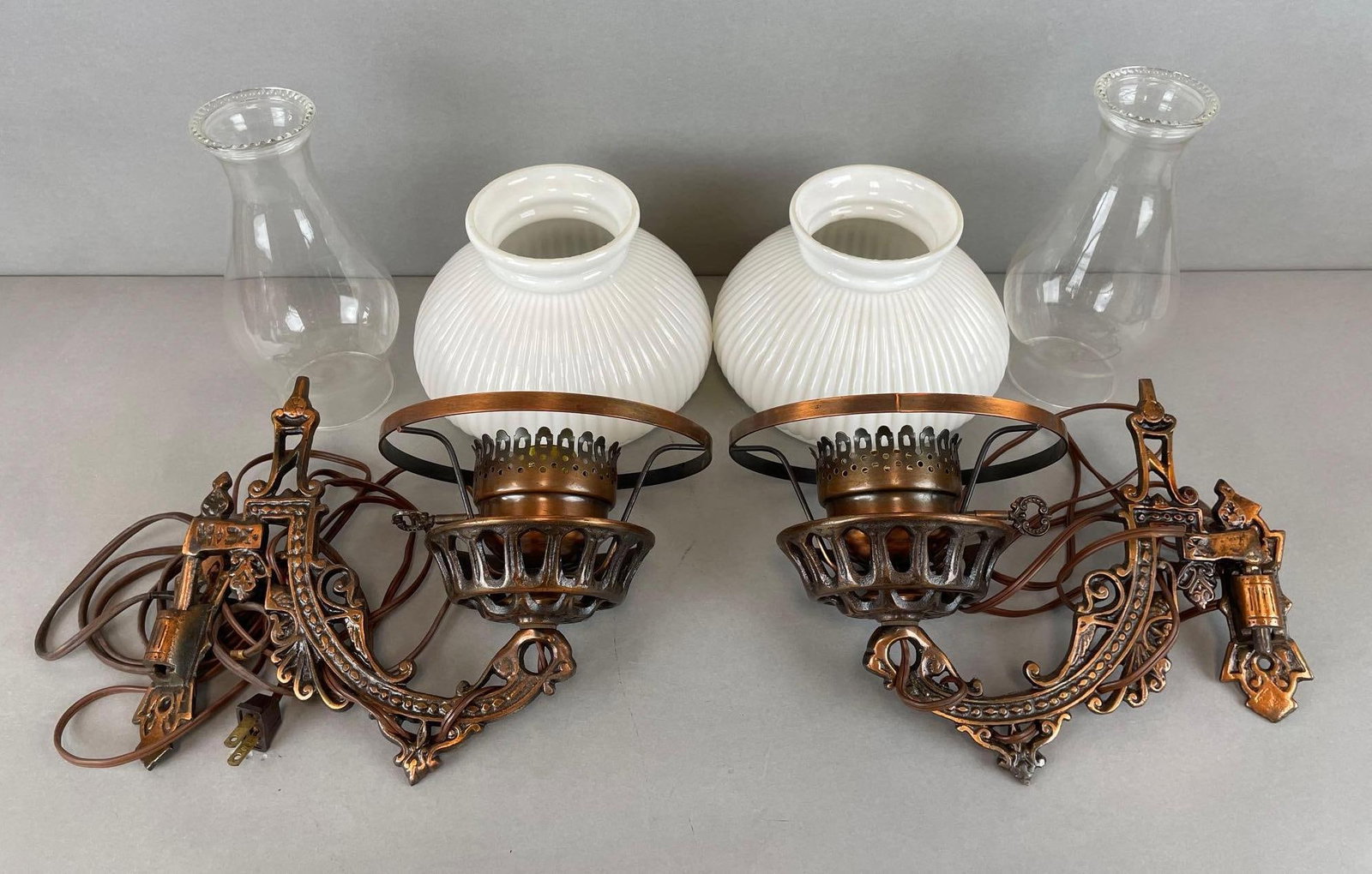 Group of 2 Victorian Cast Metal Wall Sconces with Milk Glass Shades: electric, untested. Each measure 12 x 14 inches