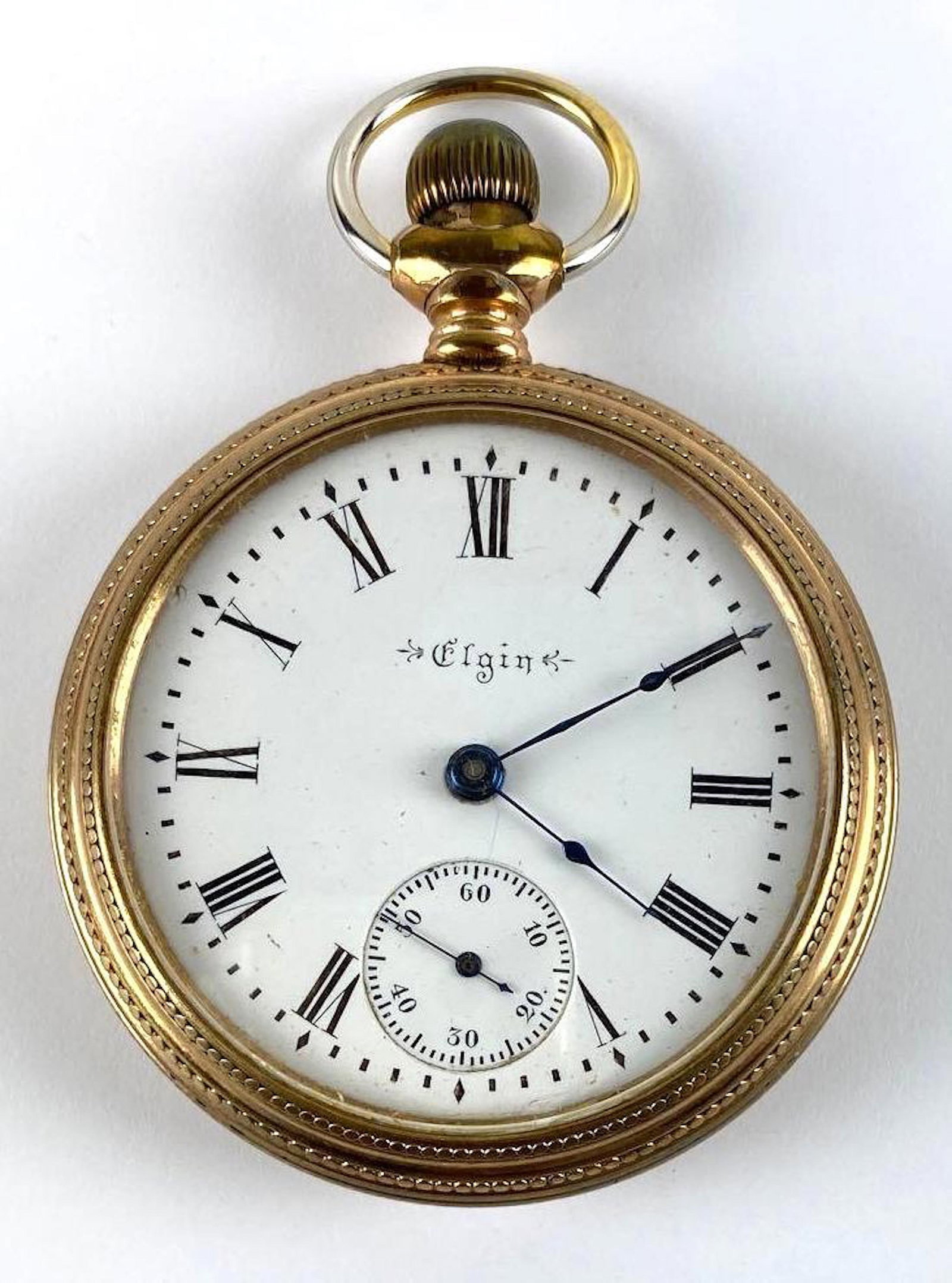 Antique Elgin 20 Year Gold Filled Open Face Pocket Watch: In working condition, 15 jewels, #8384267, measures 2.220 inches across