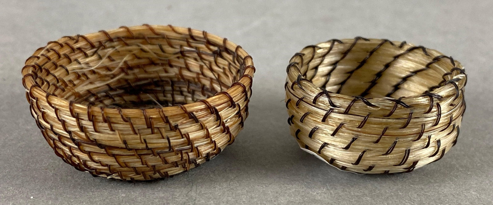 Vintage Group Native American Miniature Horsehair Handmade Baskets: Total of 2 items. Largest measures 1/2 x 1 1/4 x 1 1/4 inches.