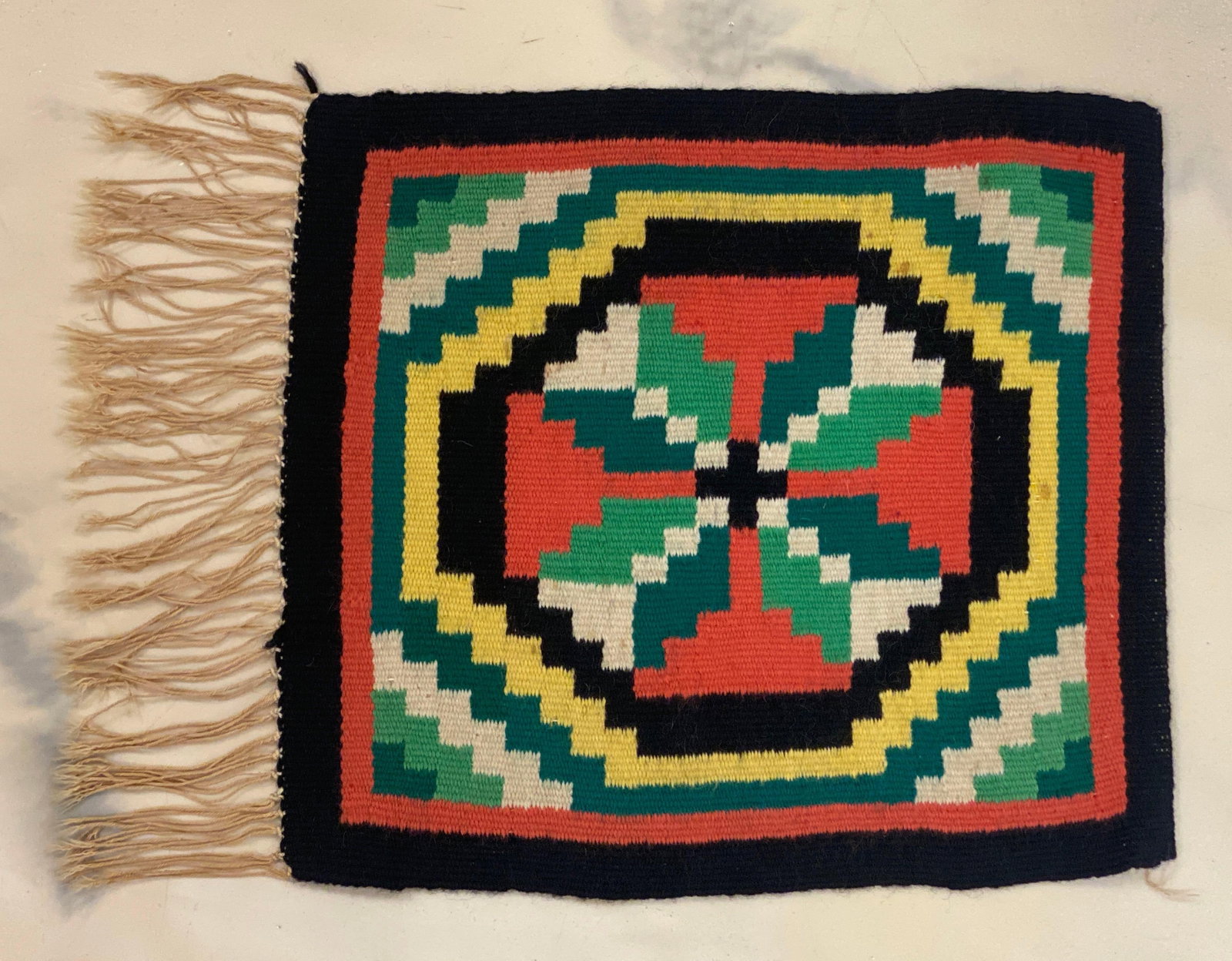 Vintage Navajo Miniature Germantown Blanket: Good condition, measures 13 1/2 x 18 inches.