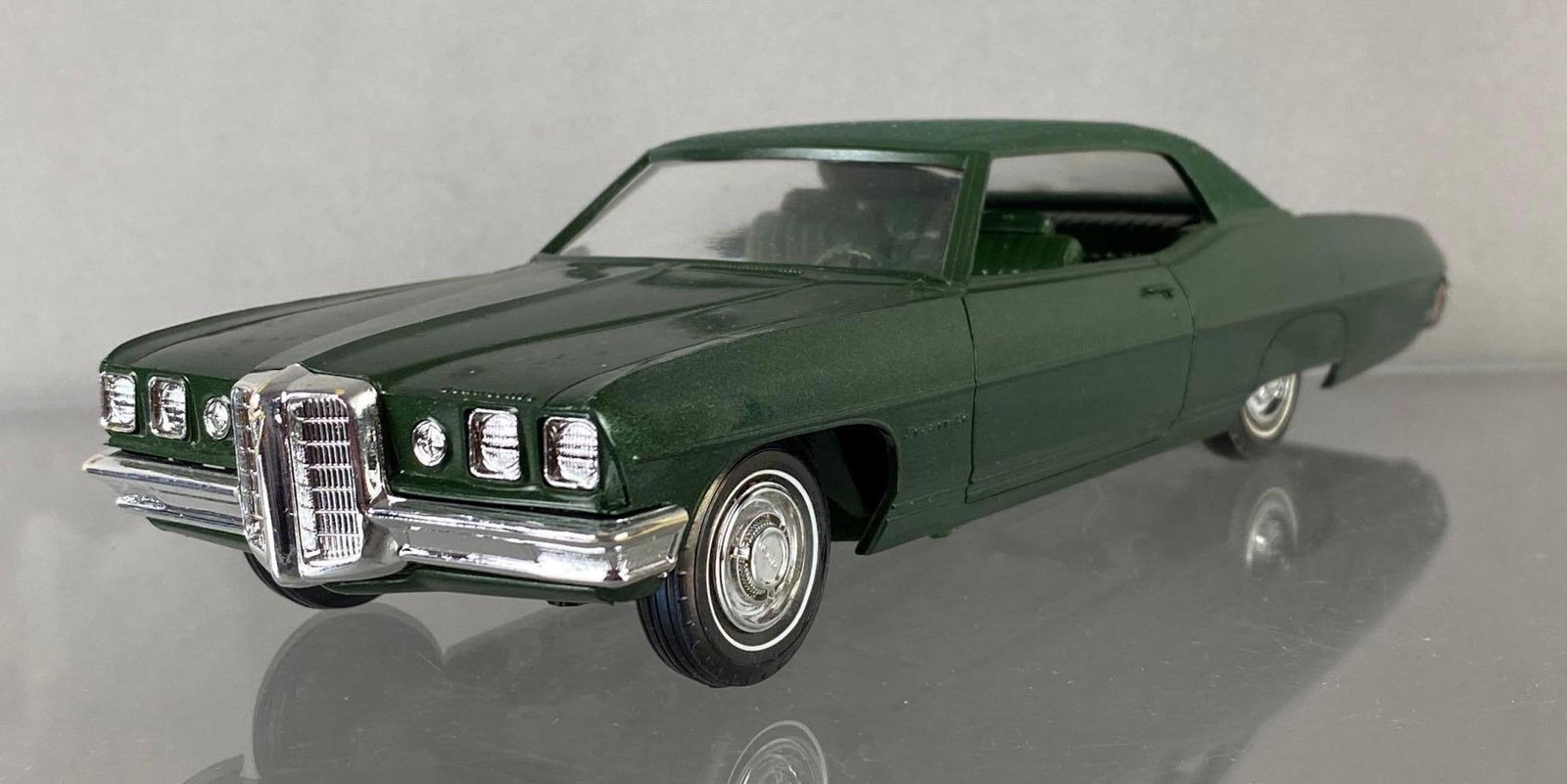 1970 Pontiac Bonneville Dealership Promo Car: Pepper Green, Hardtop. Measures 8 3/4 x 3 x 2 1/2 inches.