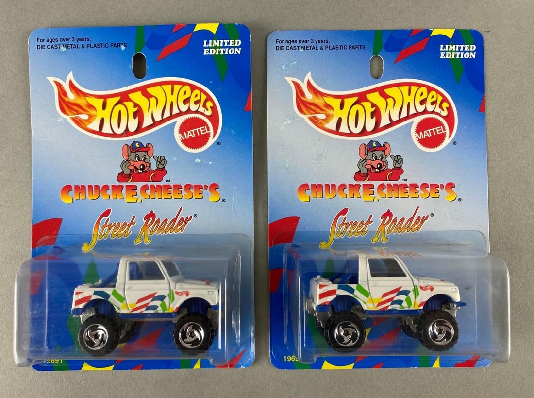 Group of 2 Hot Wheels Chuck E. Cheese No. 19691 Street Roader: 1979, Mattel, In original packaging, Limited Edition, Packaging measures 6 1/2 x 4 1/4 x 1 1/2 inches.