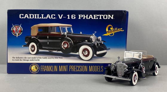 Franklin Mint Limited Edition Cadillac V-16 Phaeton: Original interior and exterior box. Die-cast. 1/24 scale. Color - Black. With COA . New condition