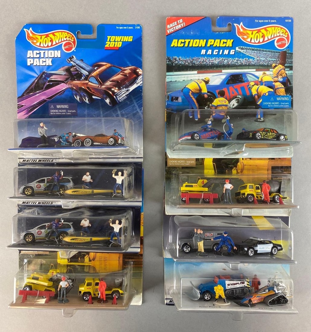 Group of 8 Hot Wheels Die-Cast Action Packs: Mattel. Includes Towing 2010, Racing, Construction, and more. In original packaging. Packaging measures 8 1/4 x 7 1/2 x 2 1/2in.