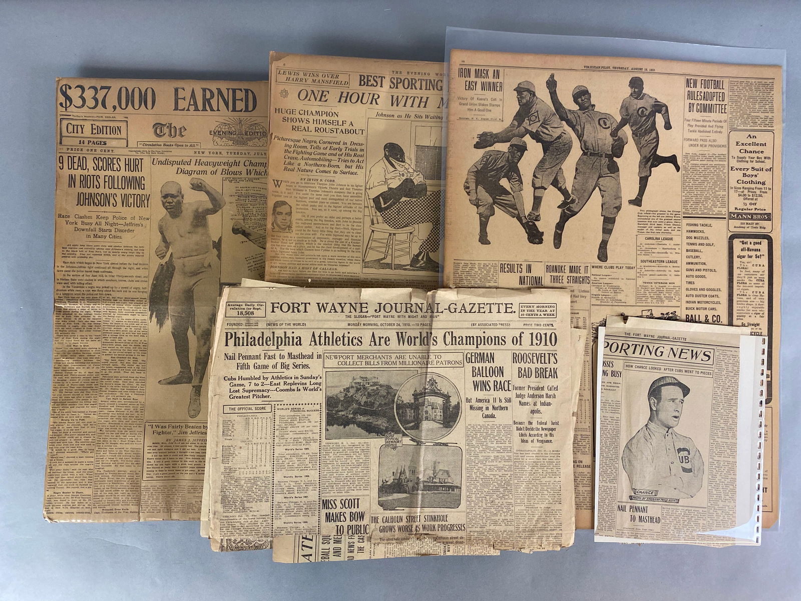 Group of Early 1900s Newspaper Clippings of Baseball and Boxing: 1910 Jack Johnson Interview 1910 Philadelphia Athletics World Champs, 1902 Baseball cartoon and more