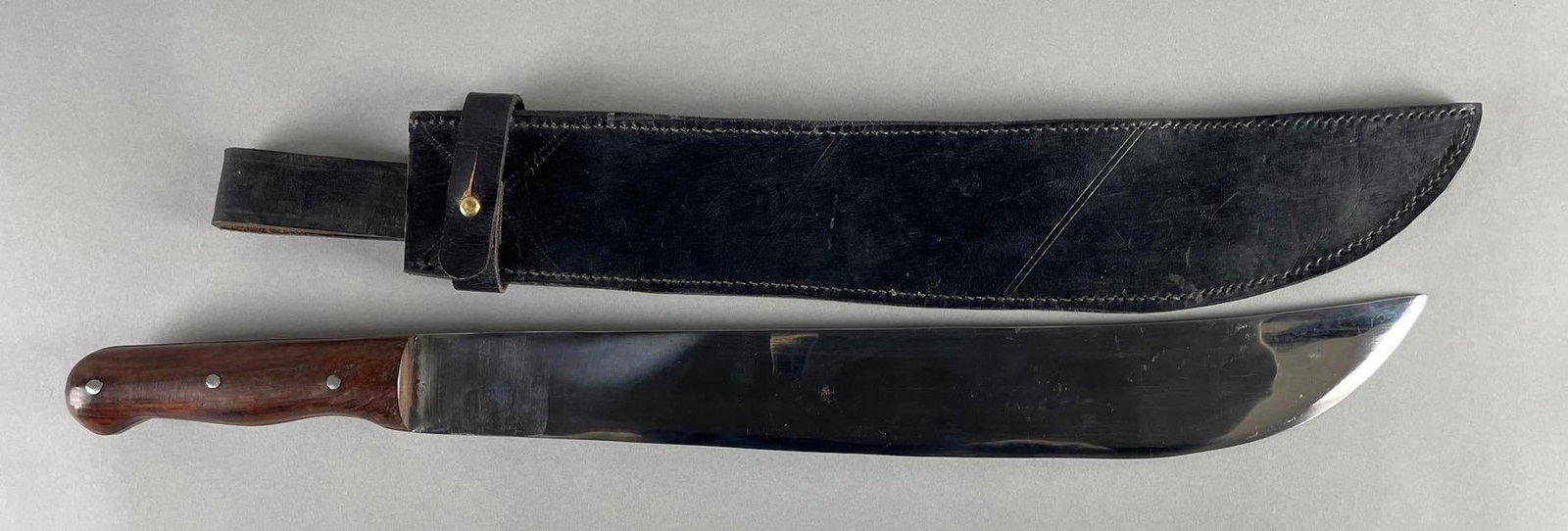 Machete with Sheath: 22 inches overall with a 16 1/2 inch sheath