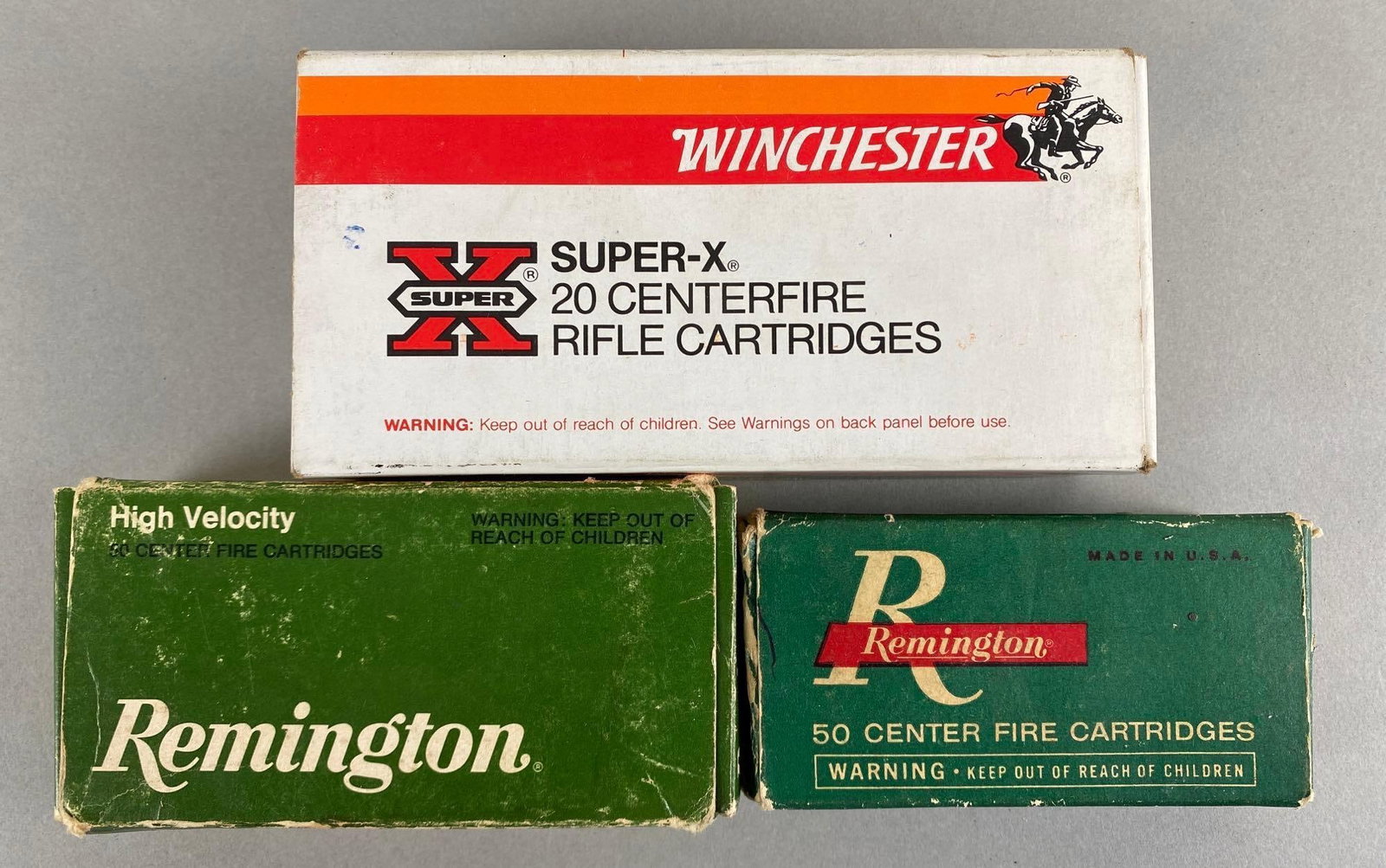 Group of 3 Boxes of Rifle Ammunition: Includes Winchester Super-X 257 Roberts 100 GR Silvertip, Remington 32 S and W, and 25 50 Grain Metal Case 6.35 mm auto pistol, All partial boxes.