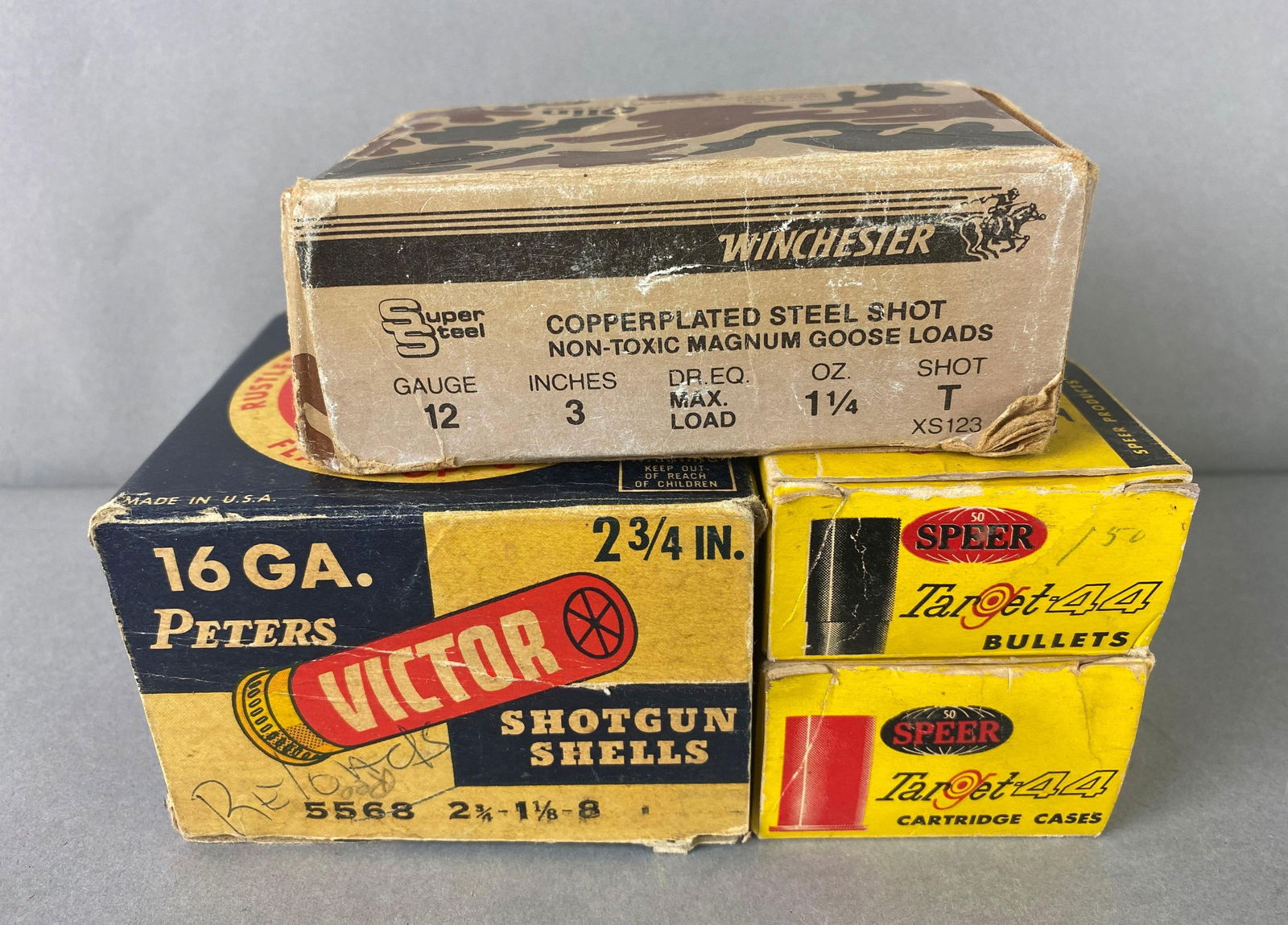Group of Vintage Ammunition in Original Boxes Various Sizes: Includes box of 12 gauge shells Winchester 3in 1 1/4oz T shot, box of Speer Target 44 cartridge cases and box of bullets, 21 Victor 16 gauge 2 3/4in 1 1/8oz 8 shot.