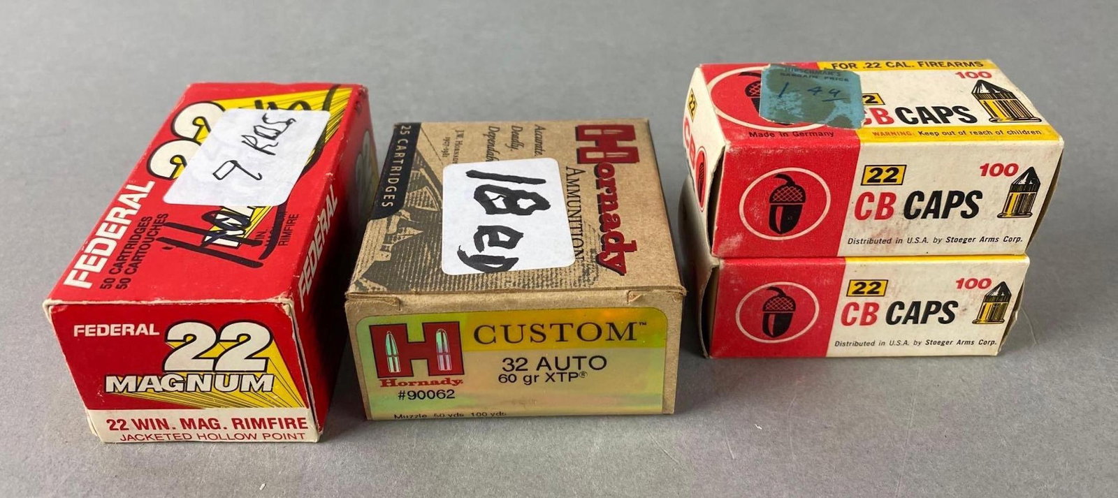 Group of Ammunition in Boxes Full and Partially Full: Includes 2 full boxes of .22 caliber caps. 22 Magnum box measures 1 1/2 x 3 1/4 x 1 1/4 inches.