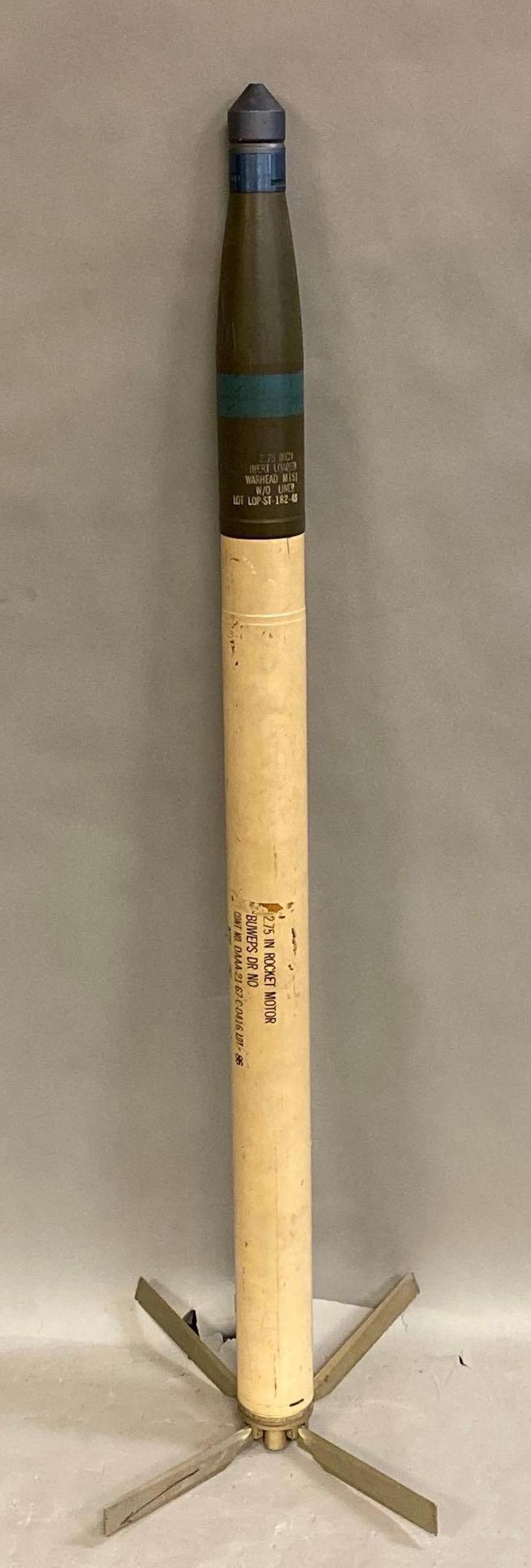 US Military Deactivated Practice Missile: Includes 2.75 inch rocket motor and inert loaded warhead M151. Untested. Measures 53 inches long.