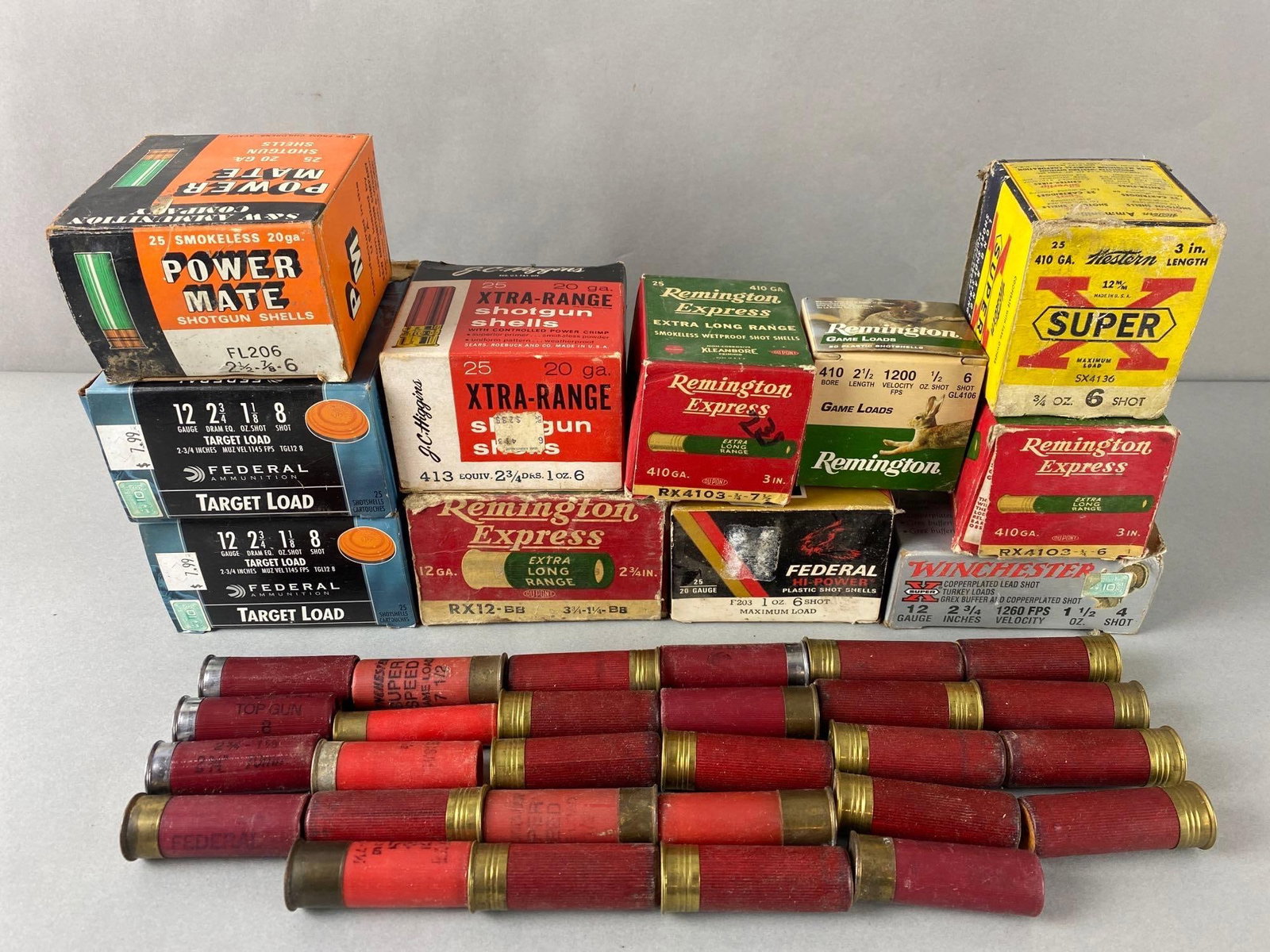 Vintage Group of Ammunition in Full and Partial Boxes: Includes boxes of 12 gauge, 20 gauge and other. Total of 11 boxes plus loose shells. Remington Federal Winchester and other brands. Boxes mixed condition, noticed shells with corrosion. Largest Reming