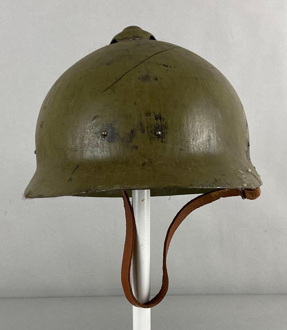 WW1 Finnish Military Helmet: With liner and chinstrap, Measures 6 1/2 x 8 1/2 x 11 inches.
