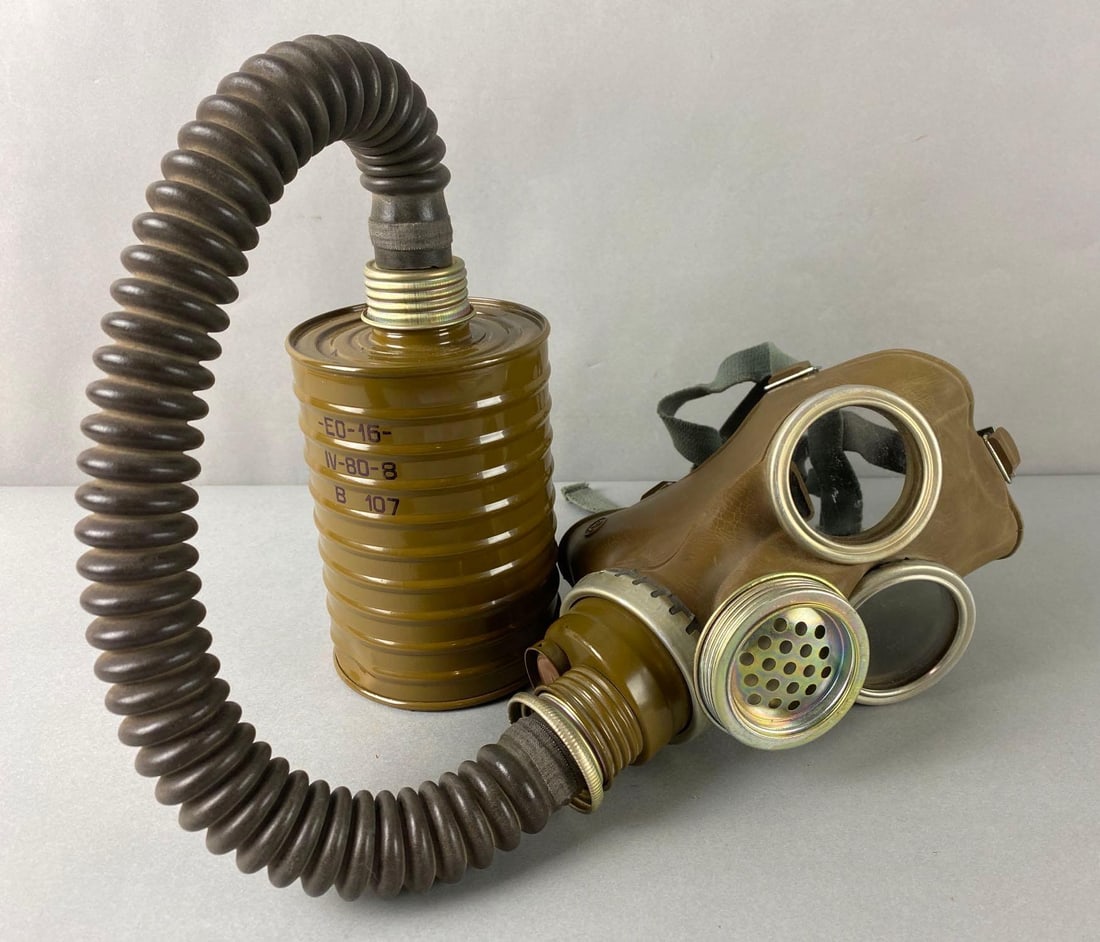 Cold War Soviet Russian Gas Mask w/ Can: USSR era item. Rubber mask has wear, obviously untested. Length of item with can attached is 35 inches.