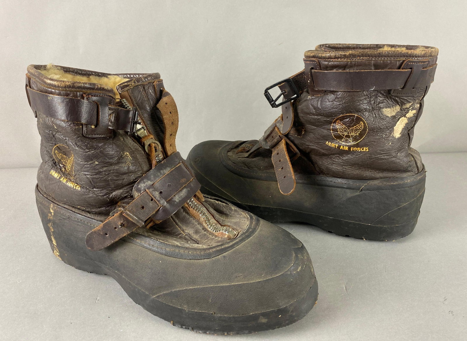 Pair US Army Air Forces A-6 Flight Boots: Size XXL, leather, plastic and wool. Mixed condition. Each measures 8 1/2 x 15 x 5 inches.