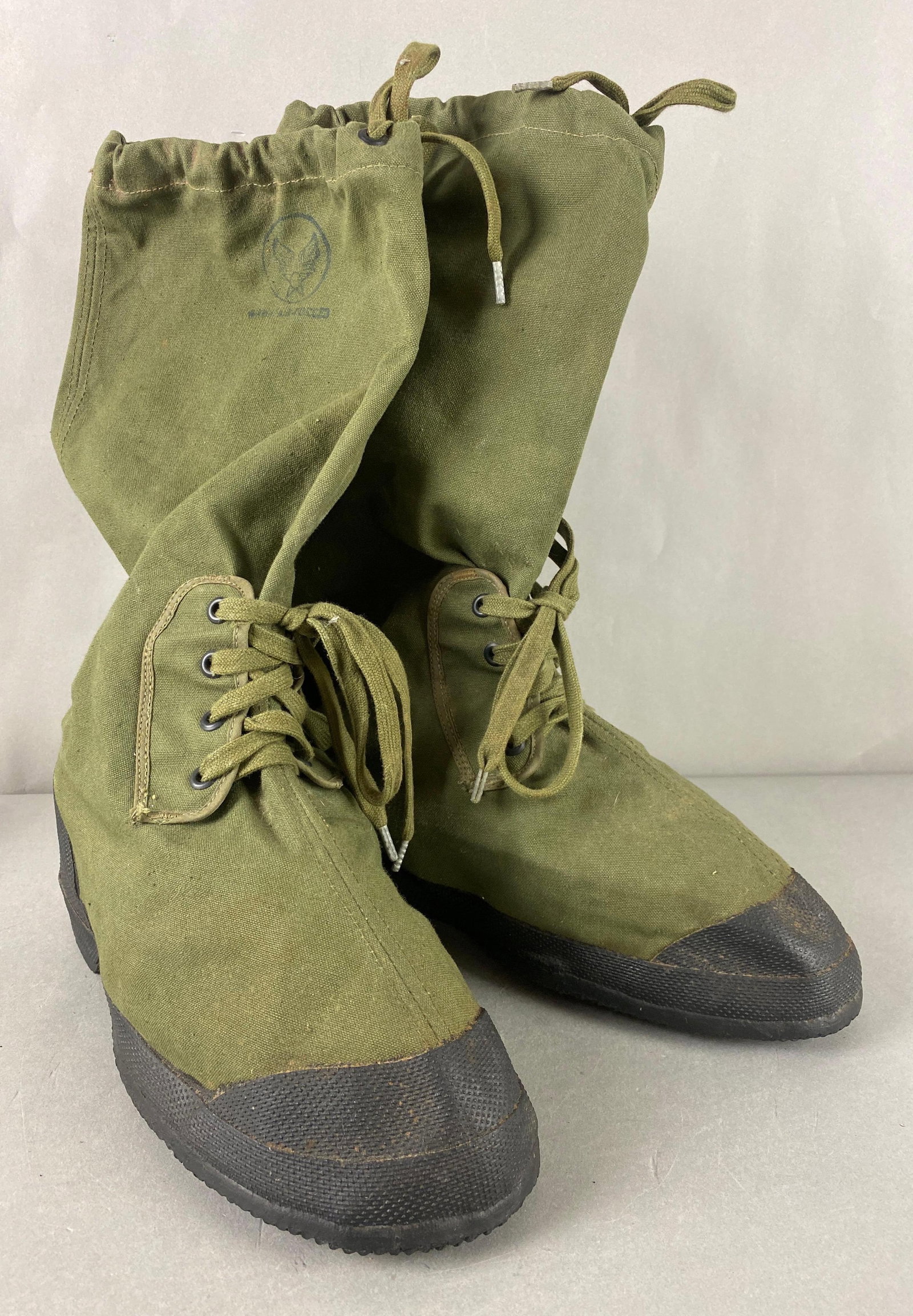 Pair of US Army Air Force A-14 Mukluk Boots: Size unknown, boot measure toe to heel 12 1/2 inches.