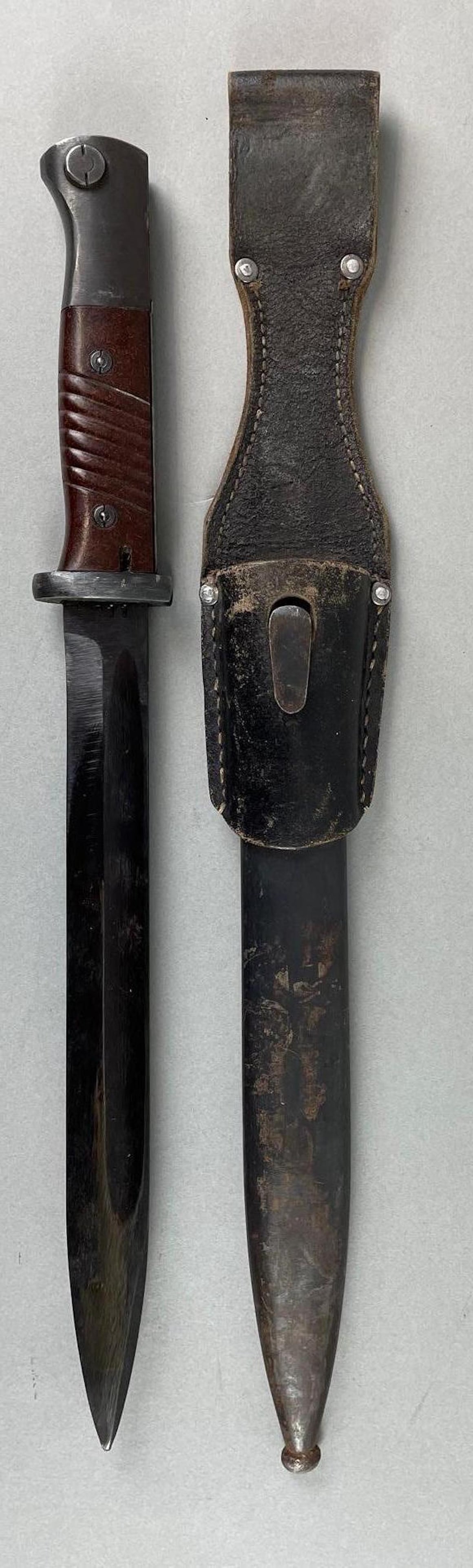 WW2 German Mauser Bayonet with Scabbard: 1011 stamp, 44 as on other side. Measures 15 inches overall with a 10 inch blade