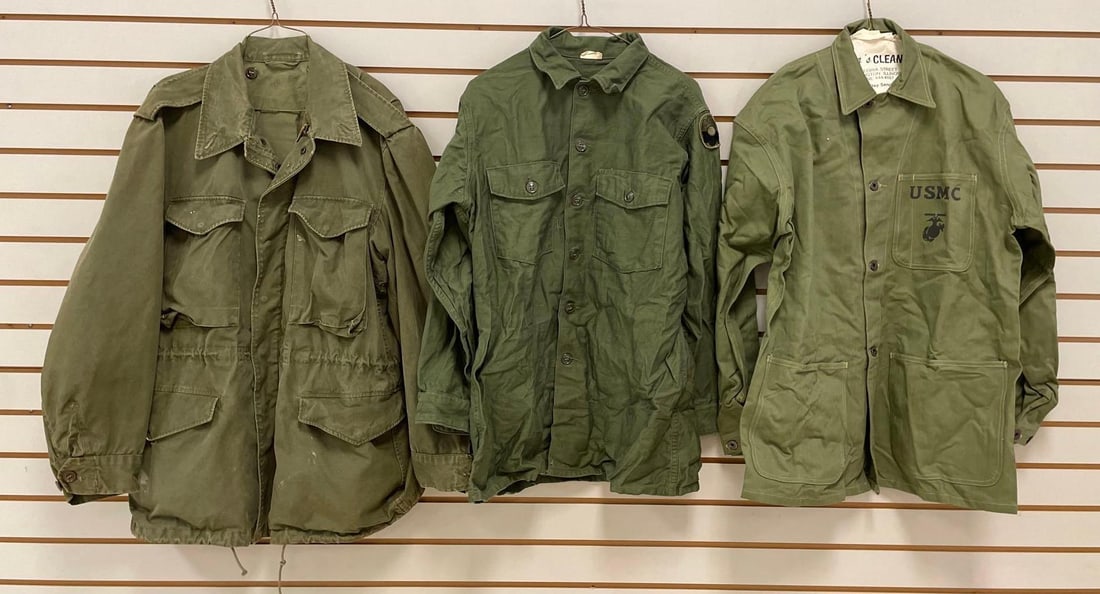 Group of 3 U.S. Military Jackets: USMC jacket is a reproduction. Includes a medium, and a 16 1/2 x 32 jacket