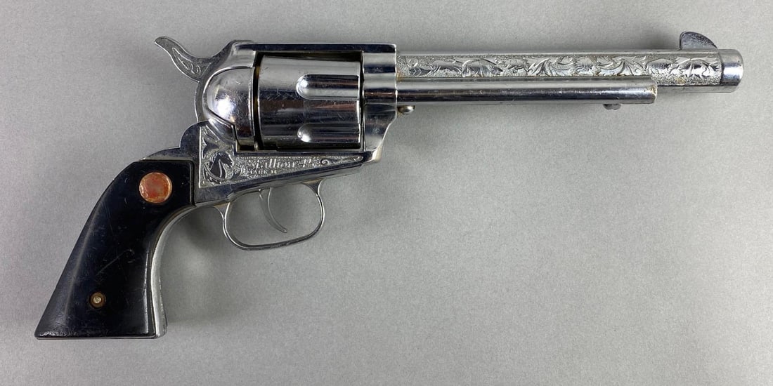 1957-62 Nichols Stallion 45 Mark 2 Cap Gun: In working condition, 6 Metal bullets, nickel die-cast body, measures 11 3/4 x 5 x 1 1/2 inches