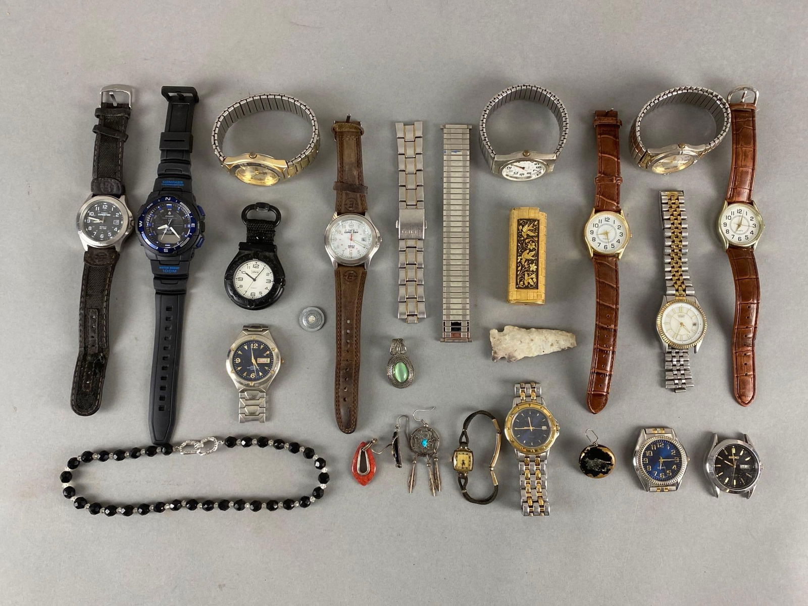 Group of 20+ Wristwatches and More: All untested, Includes Casio, Timex, single earrings, and more, Some missing or broken pieces.