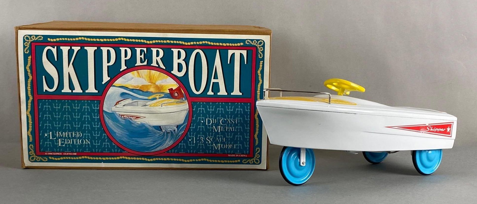 1994 Xonex Die-Cast Skipper Boat: 1/3 Scale, With box, No. 4353/10000, Includes motor, Box measures 7 1/2 x 13 x 6 1/2 inches.