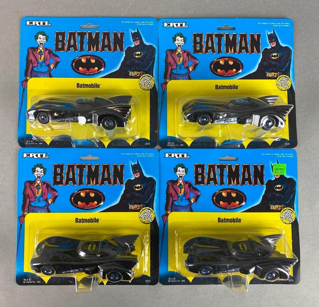 Group of 4 1989 ERTL Die-Cast Batman Batmobile: factory sealed, bent cardboard throughout, each measures 2 1/2 x 8 x 7 1/2 inches