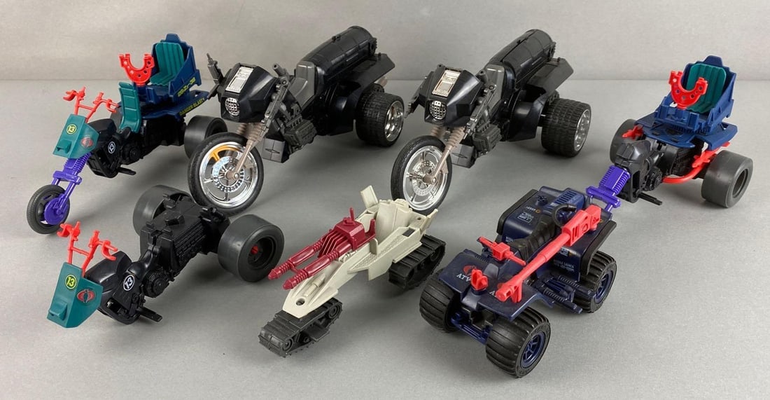 Group of 7 G.I. Joe Vehicles: Includes Rambo Savage Strike Cycle, Ferret ATV, and more. Circa 1980s, in used condition - pieces missing, largest measures
