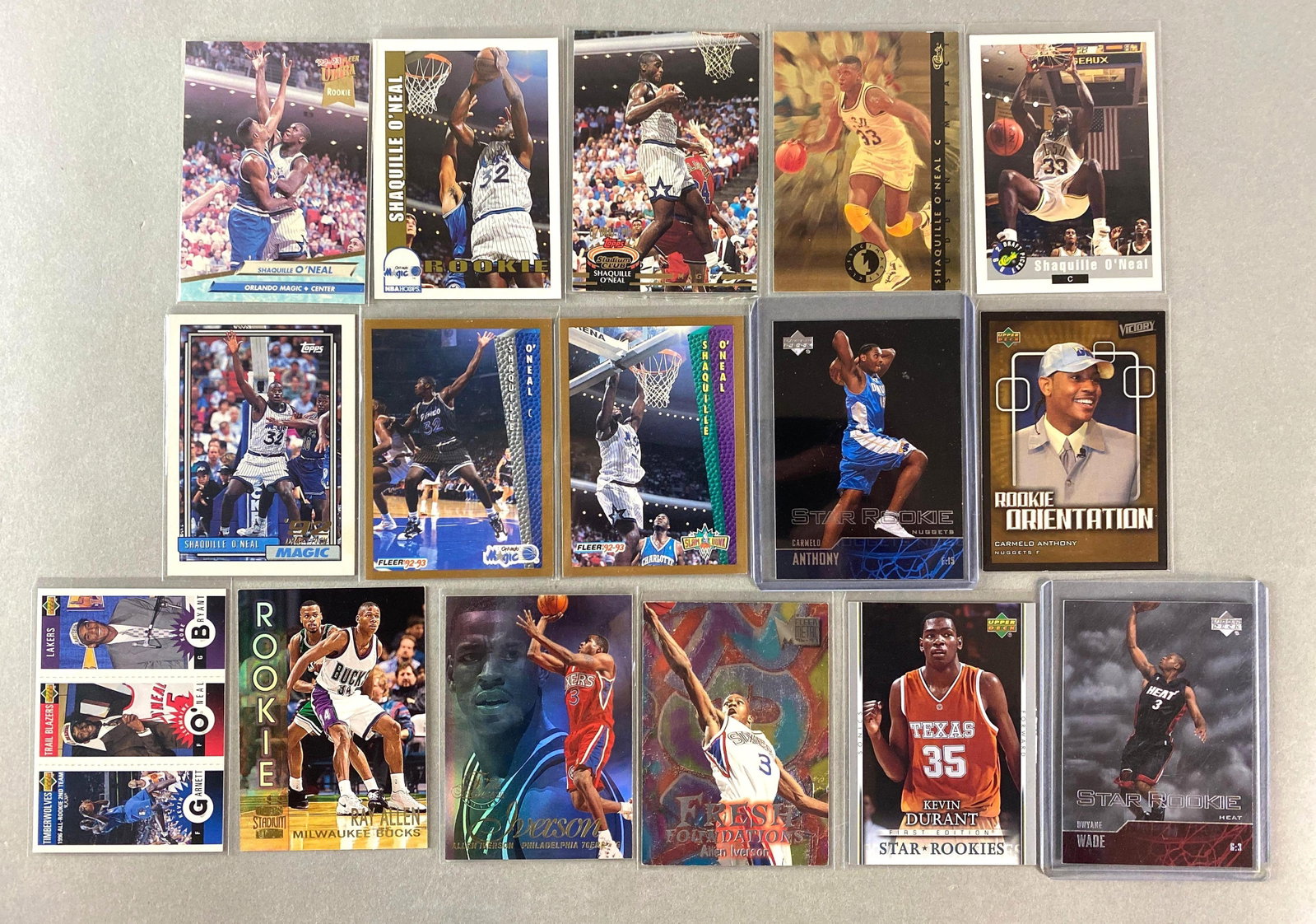 16 - 1990s - 2000s Basketball Rookie Cards: 8 - Shaquille ONeal, 2 - Carmelo Anthony, 2 - Allen Iverson, Dwayne Wade, Kevin Durant, Kobe Bryant, and Ray Allen